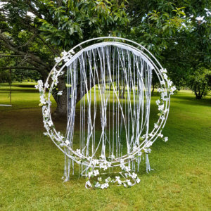 circle arch on stand dressed